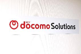 Docomo Solutions signboard and logo
